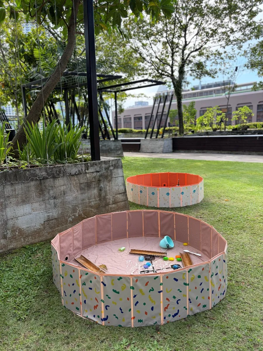 Our outdoor rooftop lawn with sensory play pools